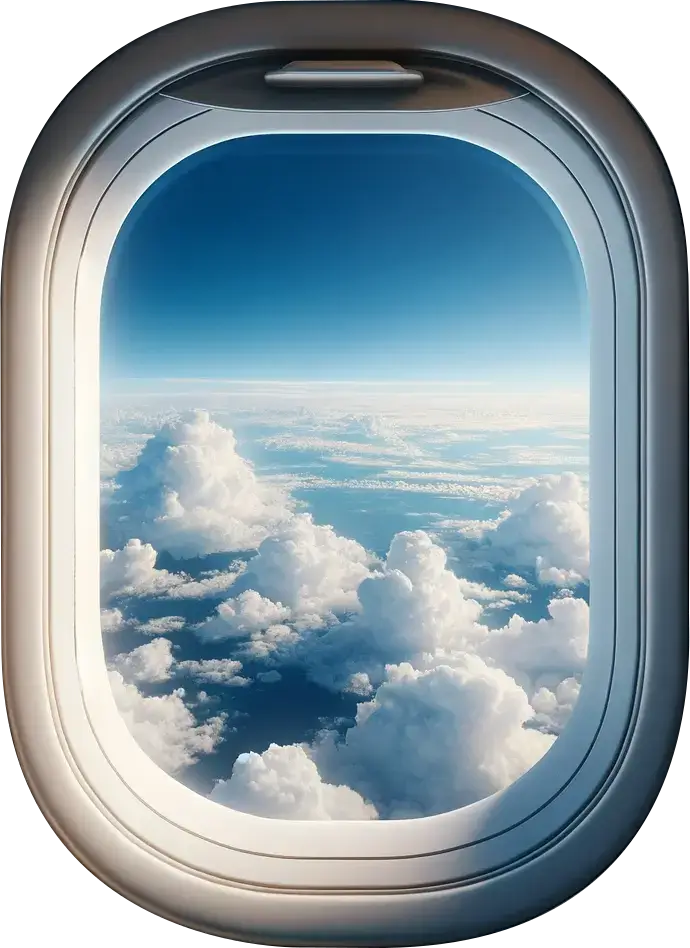 View from airplane window of clouds and sky